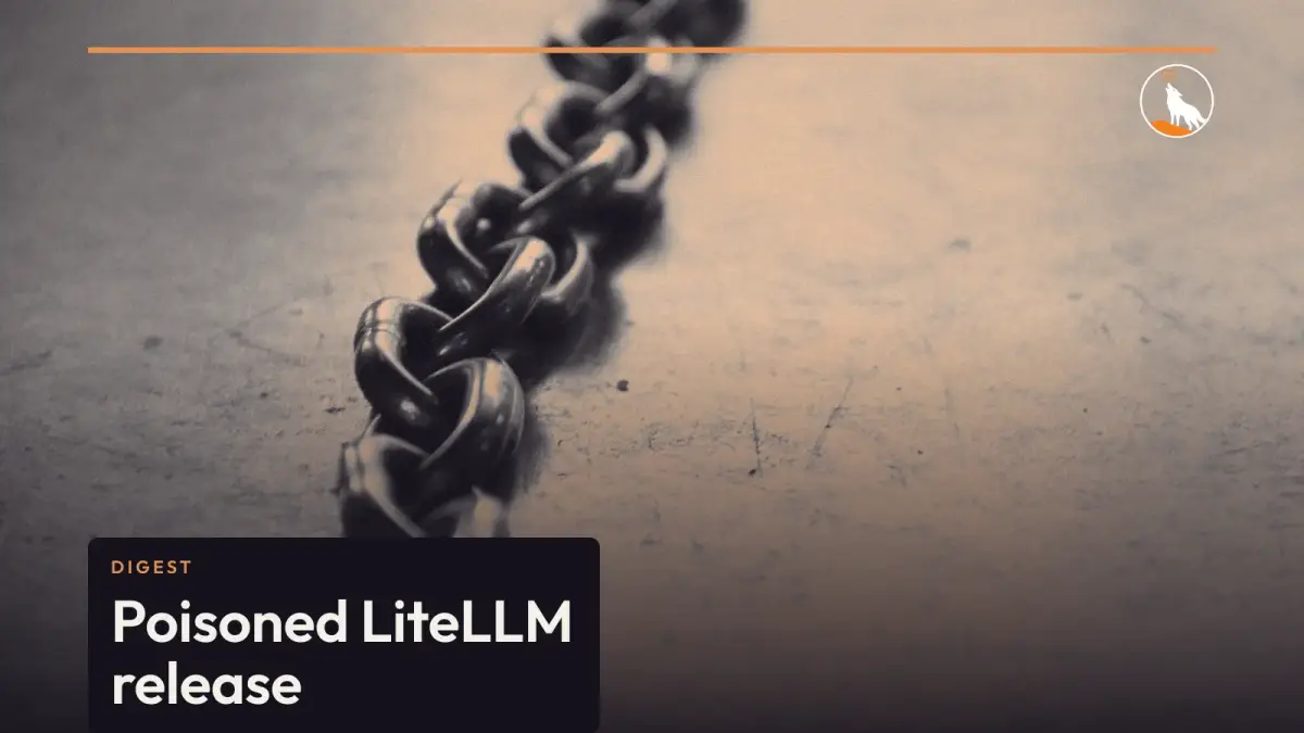 A dark steel chain lying across a scratched grey metal surface, fading out of focus.